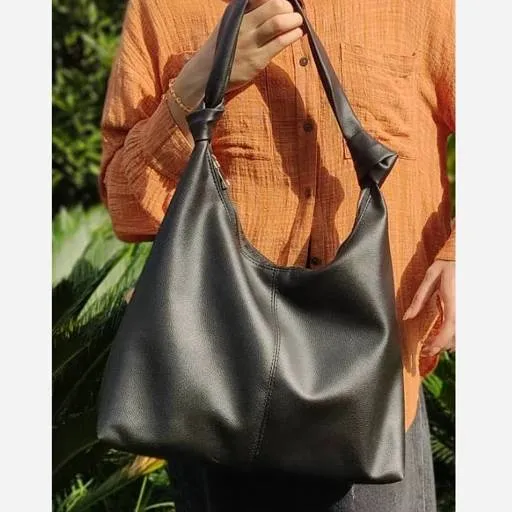کیف چرمی بند گره ای سبک و جادار رنگ مشکی و موکا