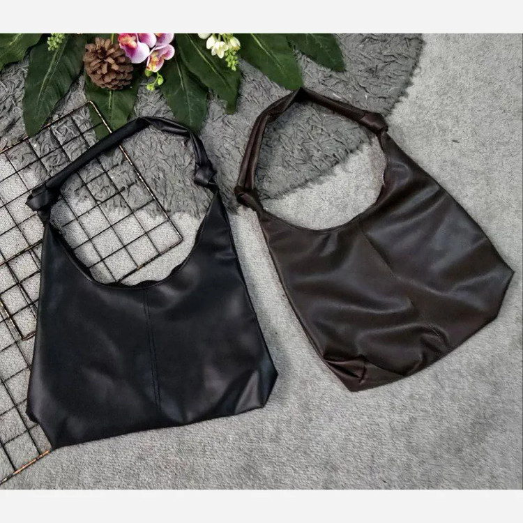 کیف چرمی بند گره ای سبک و جادار رنگ مشکی و موکا