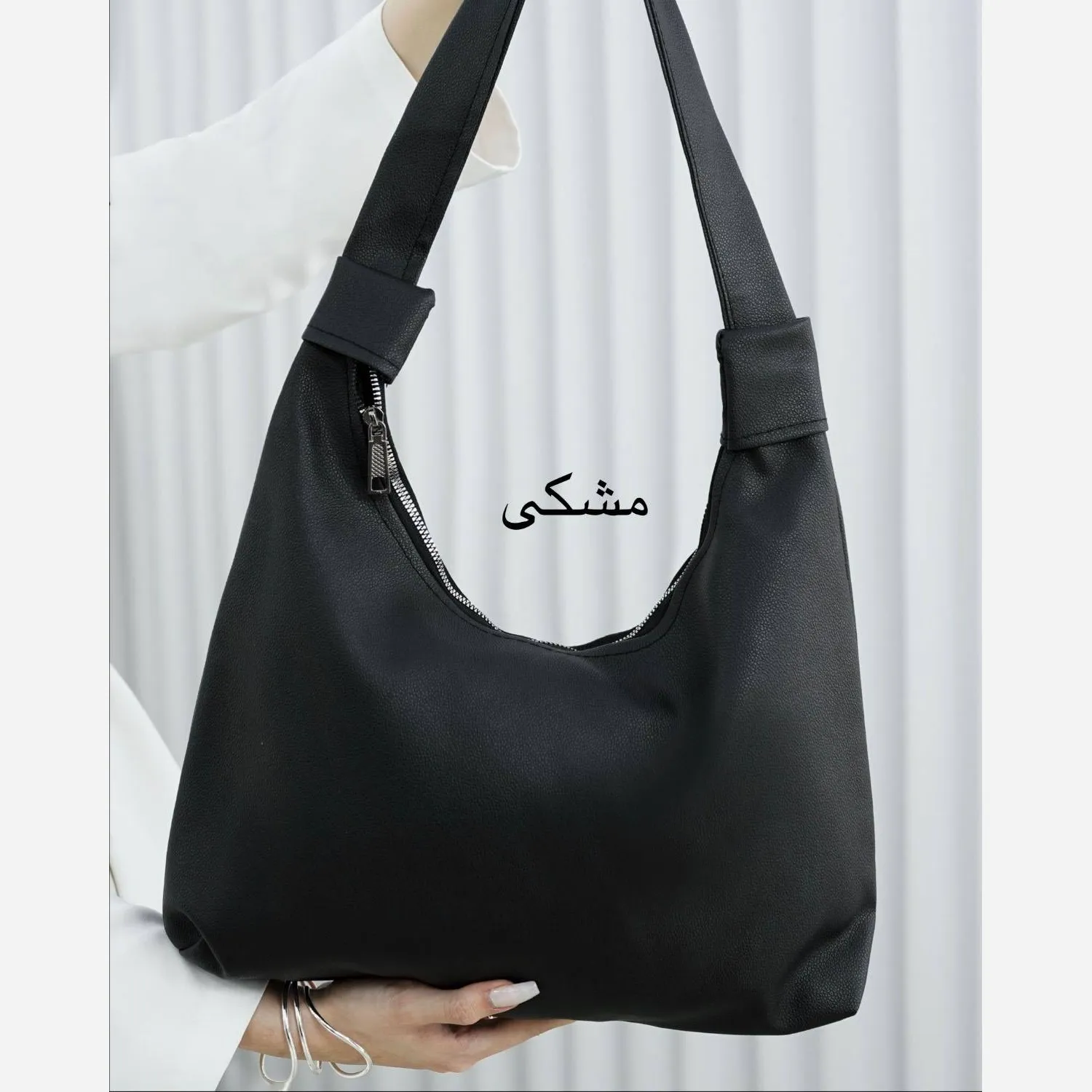 کیف چرمی بند گره ای سبک و جادار رنگ مشکی و موکا