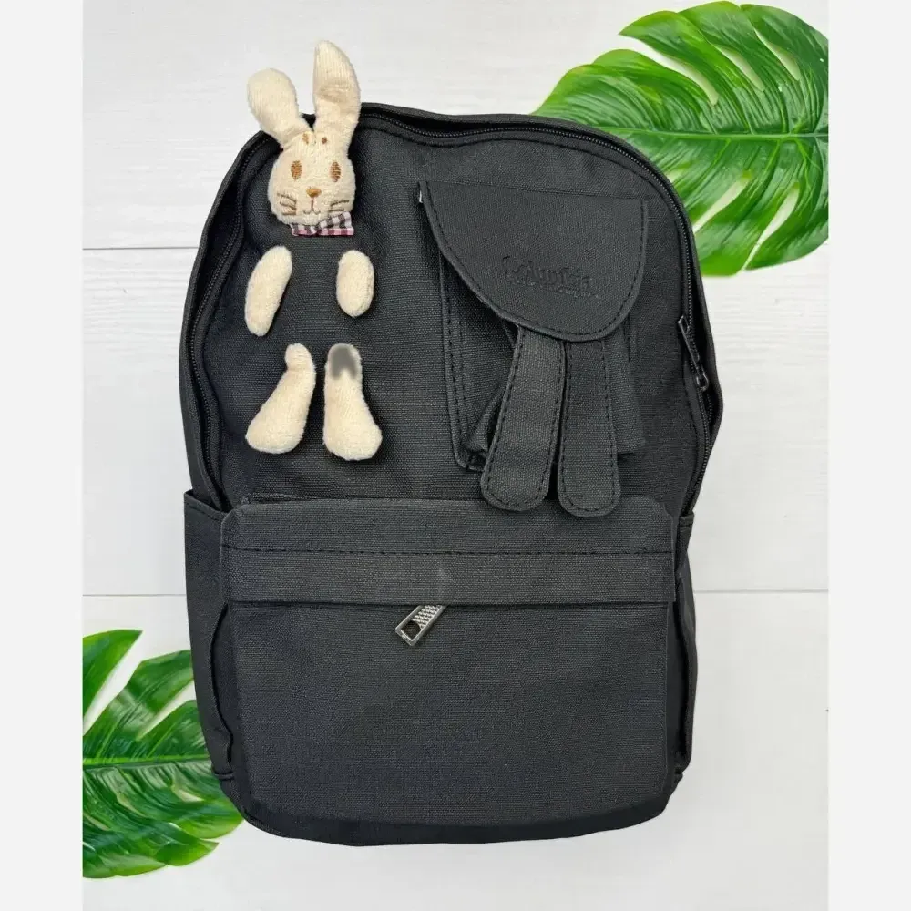 کوله پشتی ملوسک جنس چرم خیس رنگ مشکی سایز 35 در 40 سانت