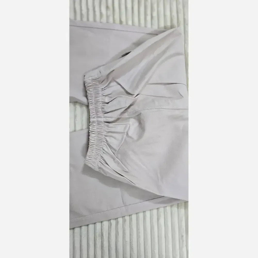 شلوار نیم بگ کتان کش زنانه رنگ بندی متنوع سایز L تا 3XL