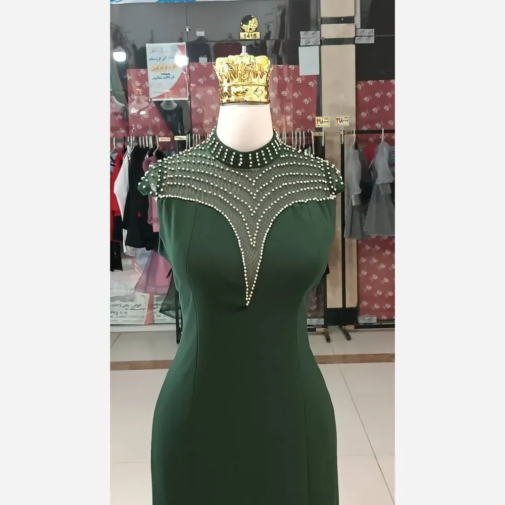پیراهن زنانه مروارید جنس کرپ دالقیچ قد 150 با کمربند رنگ مشکی و سبز