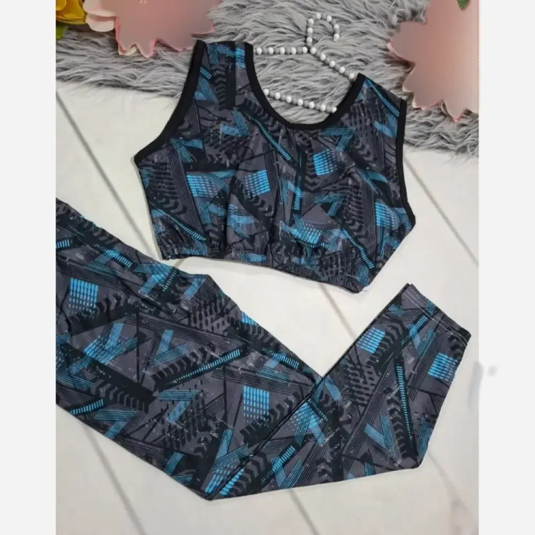 ست ورزشی نیم تنه و شلوار فلامنت فول کش فری سایز
