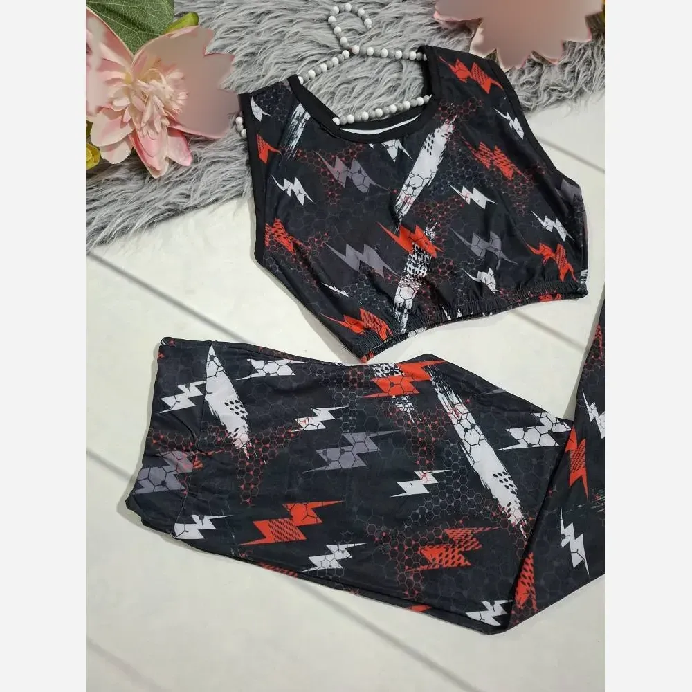 ست ورزشی نیم تنه و شلوار فلامنت فول کش فری سایز