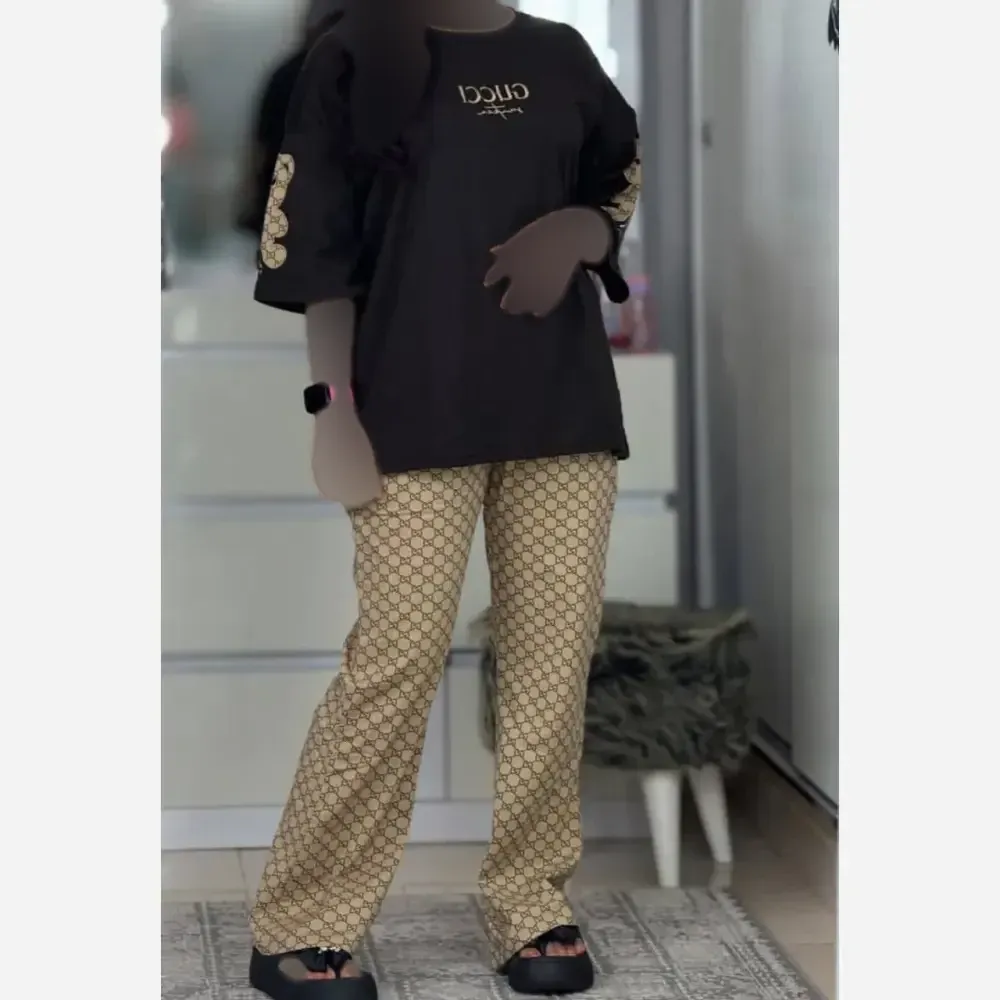 ست لباس زنانه مدل لویی جنس پنبه گلکسی رنگ مشکی سایز فری 38 تا 46