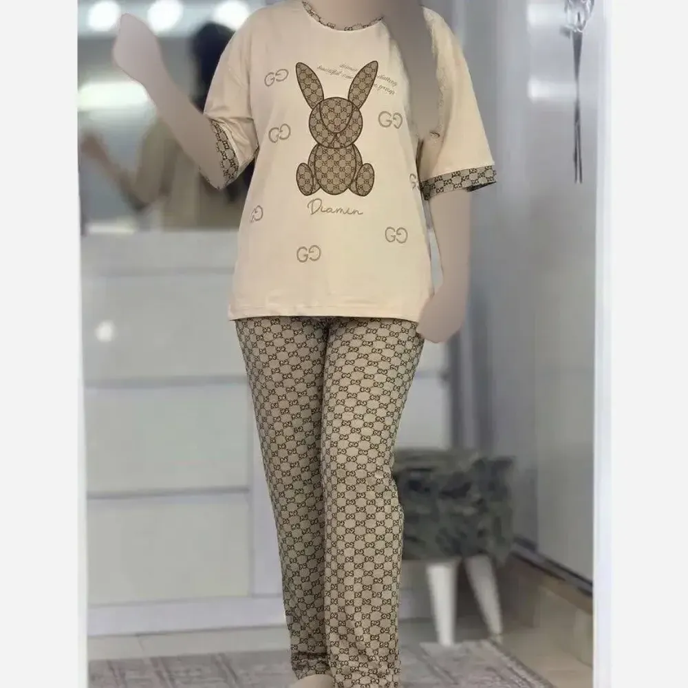 ست تیشرت شلوار زنانه طرح خرگوش جنس دورس اسپان رنگ کرم سایز 38 تا 46