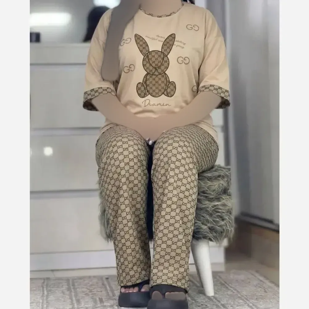 ست تیشرت شلوار زنانه طرح خرگوش جنس دورس اسپان رنگ کرم سایز 38 تا 46