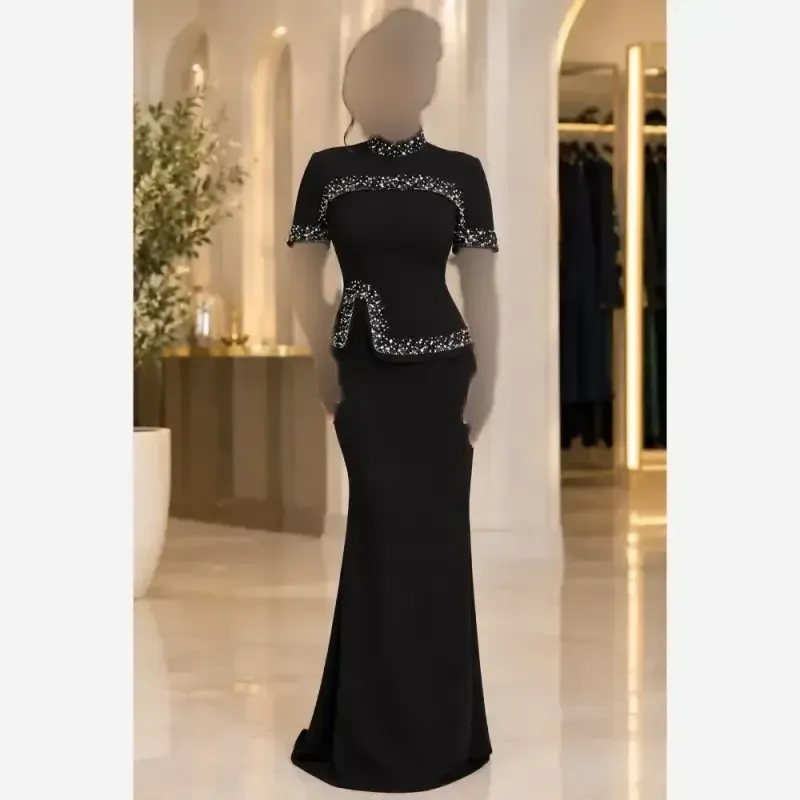 ست دوتیکه ماکسی و شنل مدل پریسیما کرپ دالقیچ و حریر مروارید و نگین دار رنگ سرمه ای و مشکی