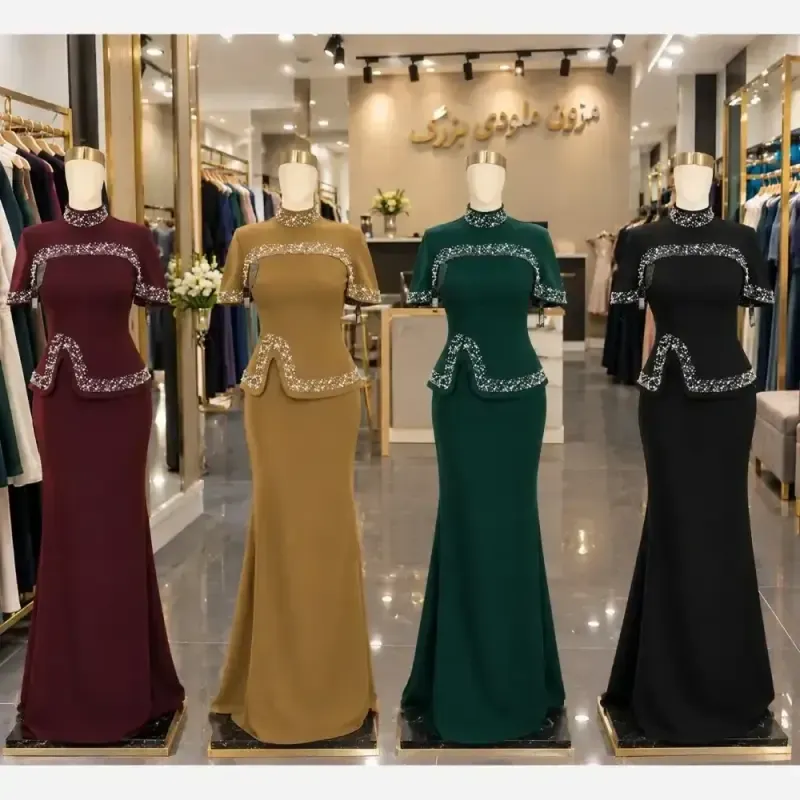ست دوتیکه ماکسی و شنل مدل پریسیما کرپ دالقیچ و حریر مروارید و نگین دار رنگ سرمه ای و مشکی